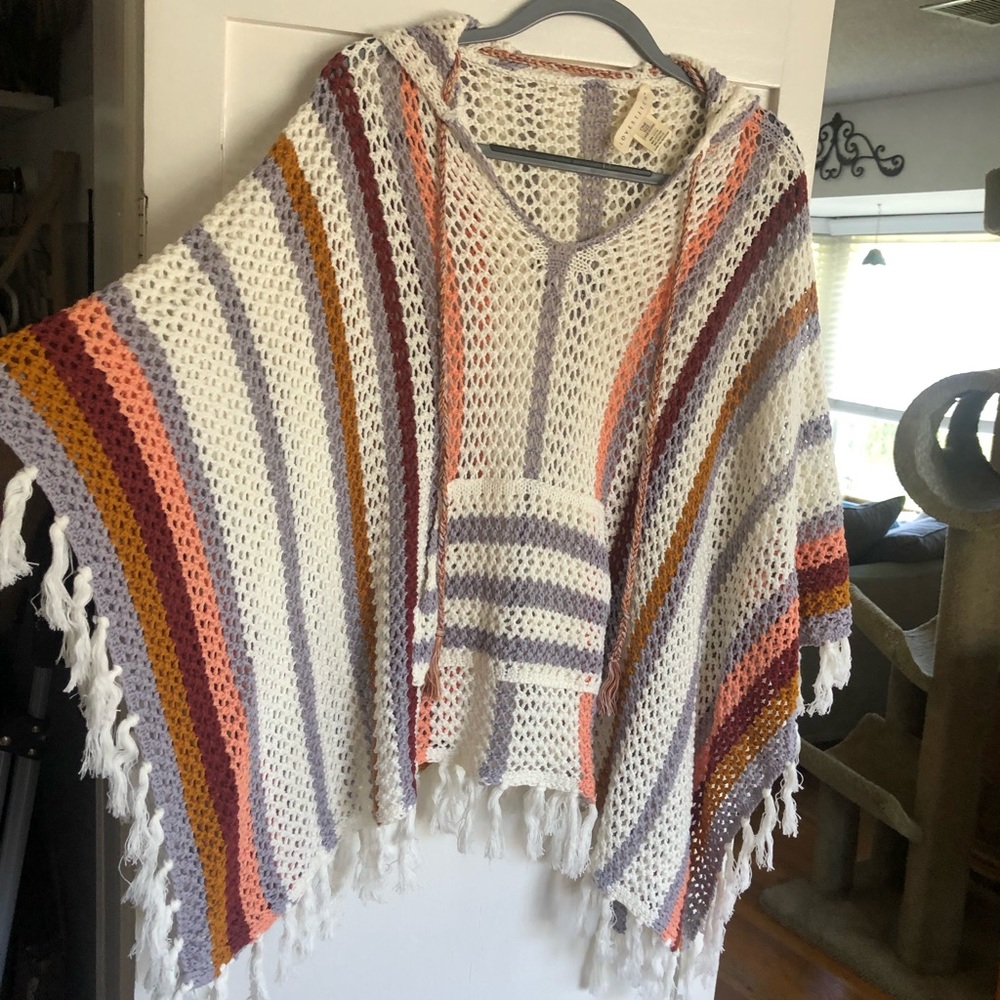 Love stitch poncho- gently used great condition
